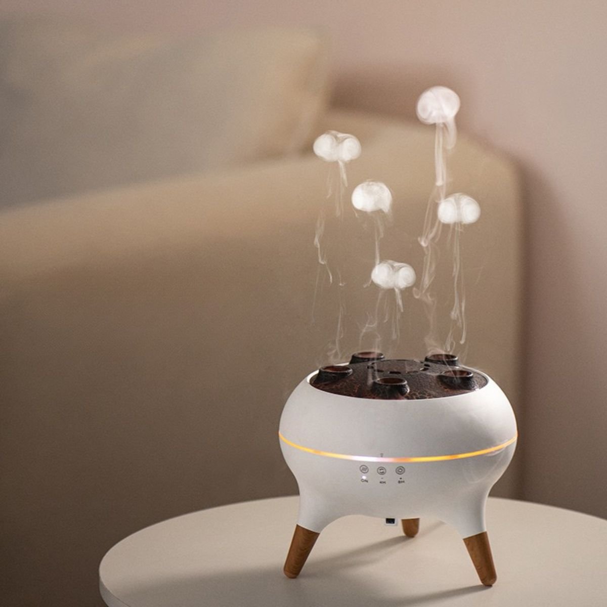 Jellyfish aromatherapy humidifier on desk with remote